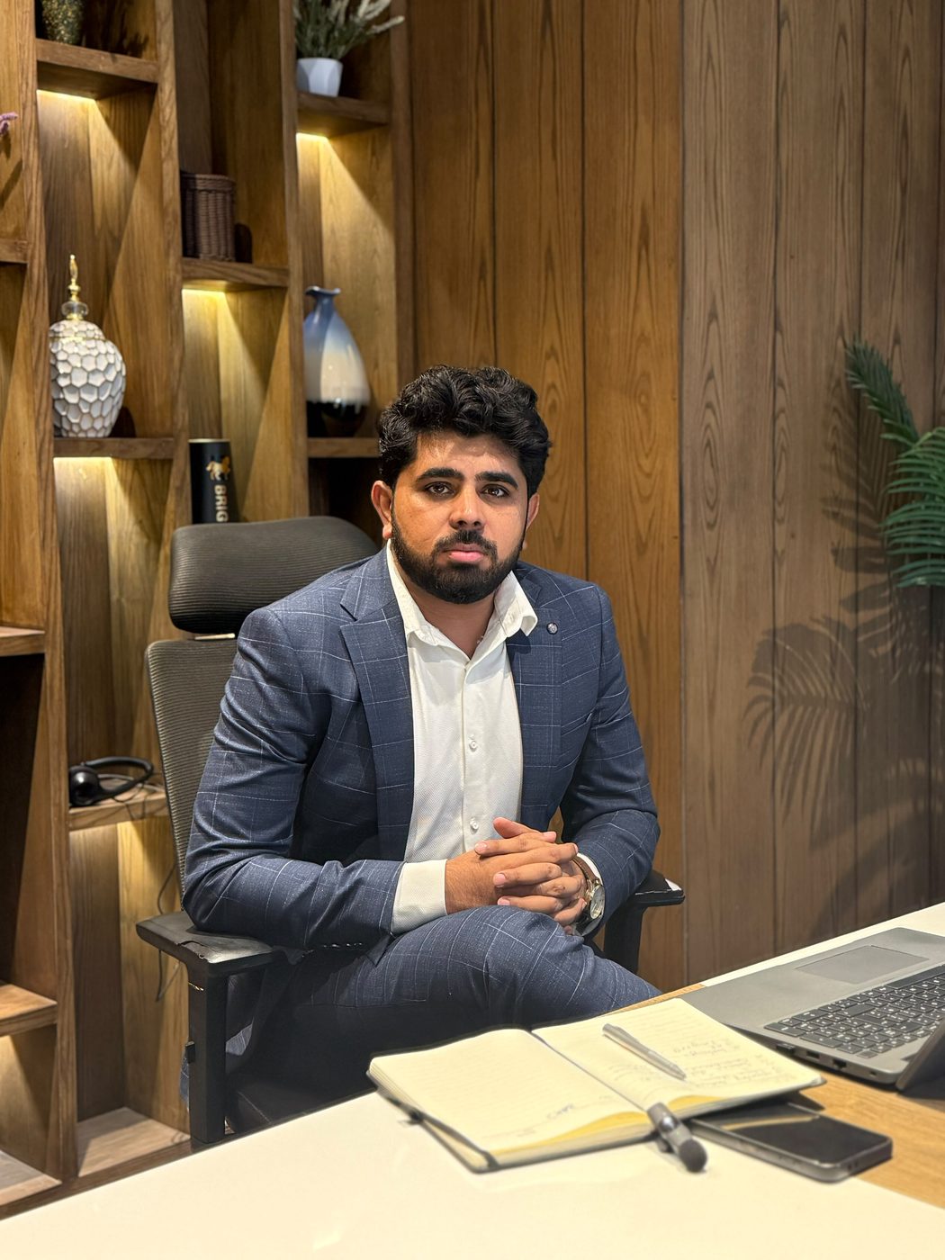 Hafiz Muhammad Farhan at his desk, technology executive and software architect
